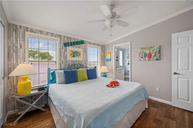 a bedroom with a bed dresser and a window