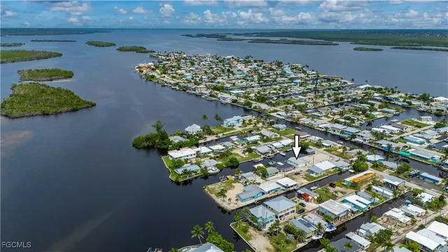 an aerial view of a houses with outdoor space