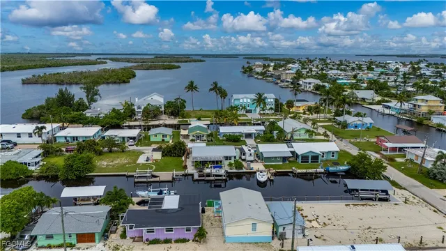 a view of multiple houses with yard