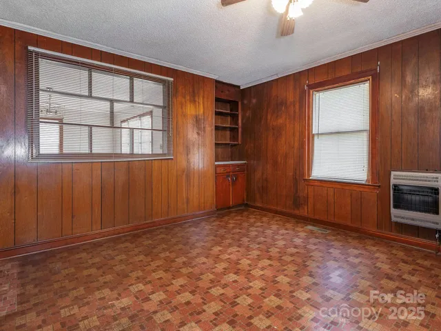 an empty room with windows