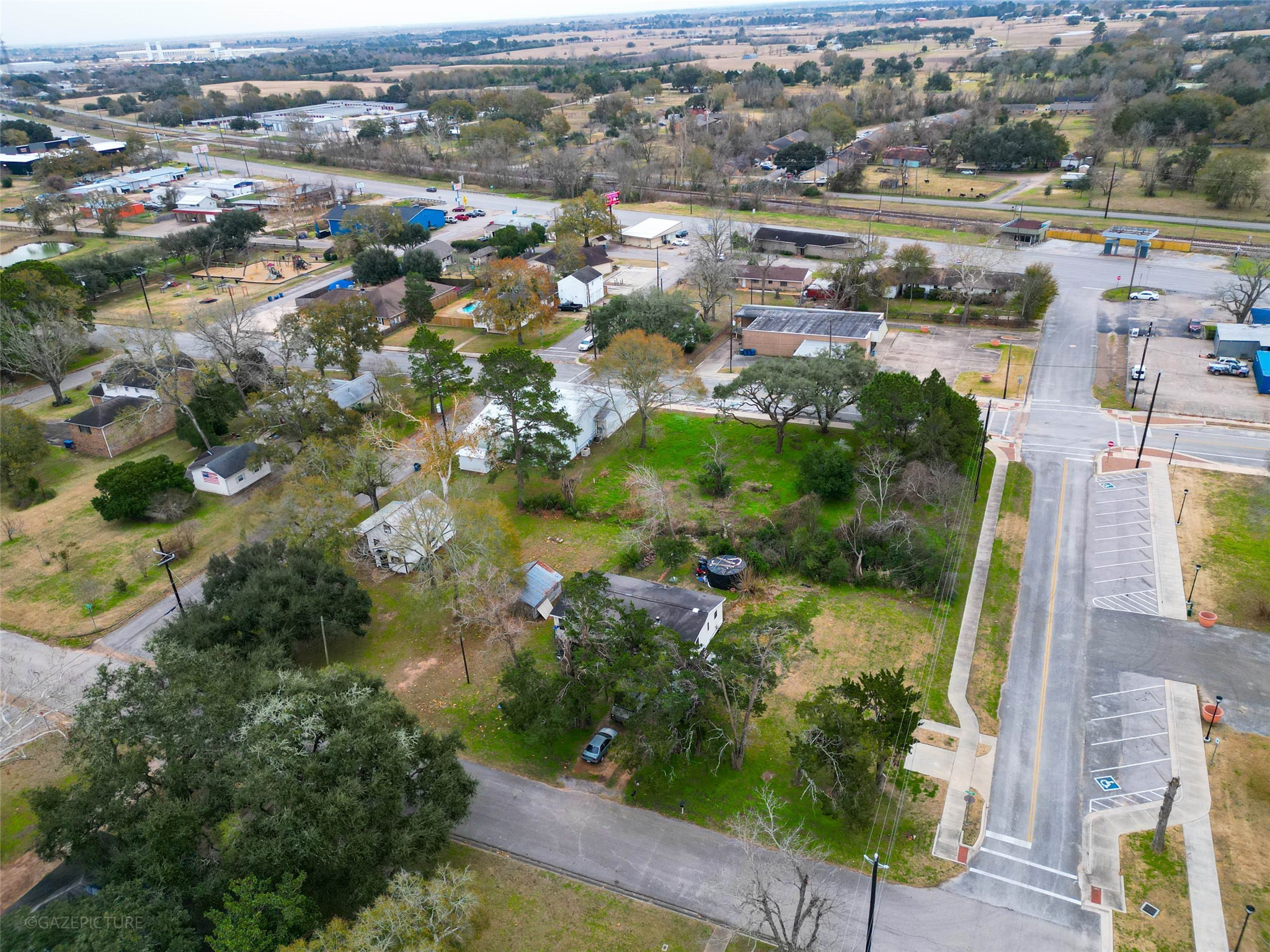 0 Cherry Street Waller, TX 77484 - Photo 5 of 5 an aerial view of residential houses with outdoor space