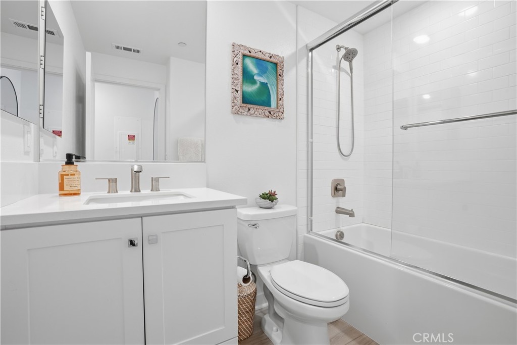 1401 Lasso Way, Unit 201 Rancho Mission Viejo, CA 92694 - Photo 12 of 69 a bathroom with a sink toilet and shower