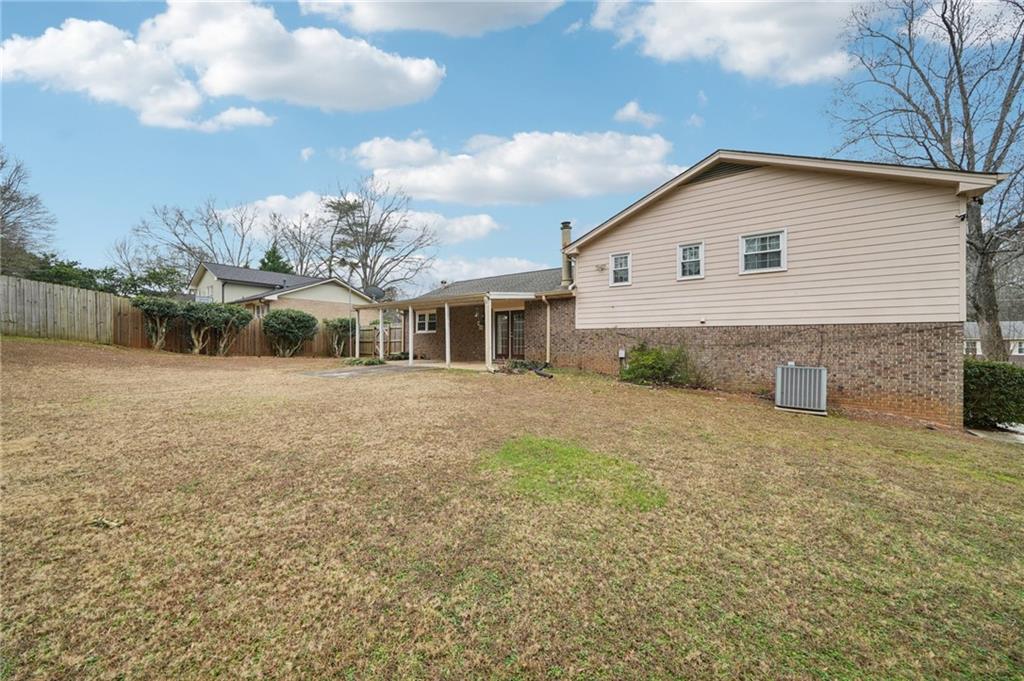 1315 Sanden Ferry Drive Decatur, GA 30033 - Photo 31 of 33 a view of a house with a yard