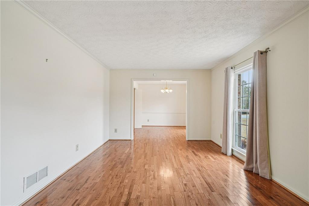 1315 Sanden Ferry Drive Decatur, GA 30033 - Photo 5 of 33 wooden floor in an empty room