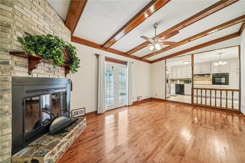 1315 Sanden Ferry Drive Decatur, GA 30033 - Photo 9 of 33 a view of a livingroom with furniture and wooden floor