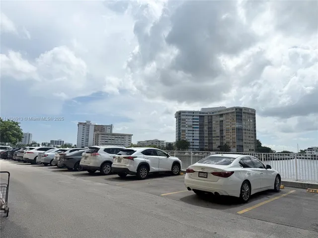 a view of a swimming pool and a yard