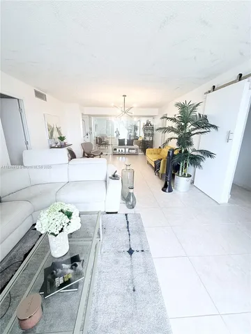 view of living room with furniture and window