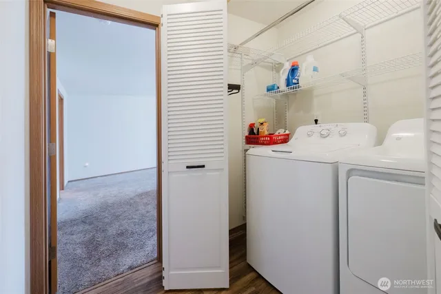 a utility room with dryer and washer