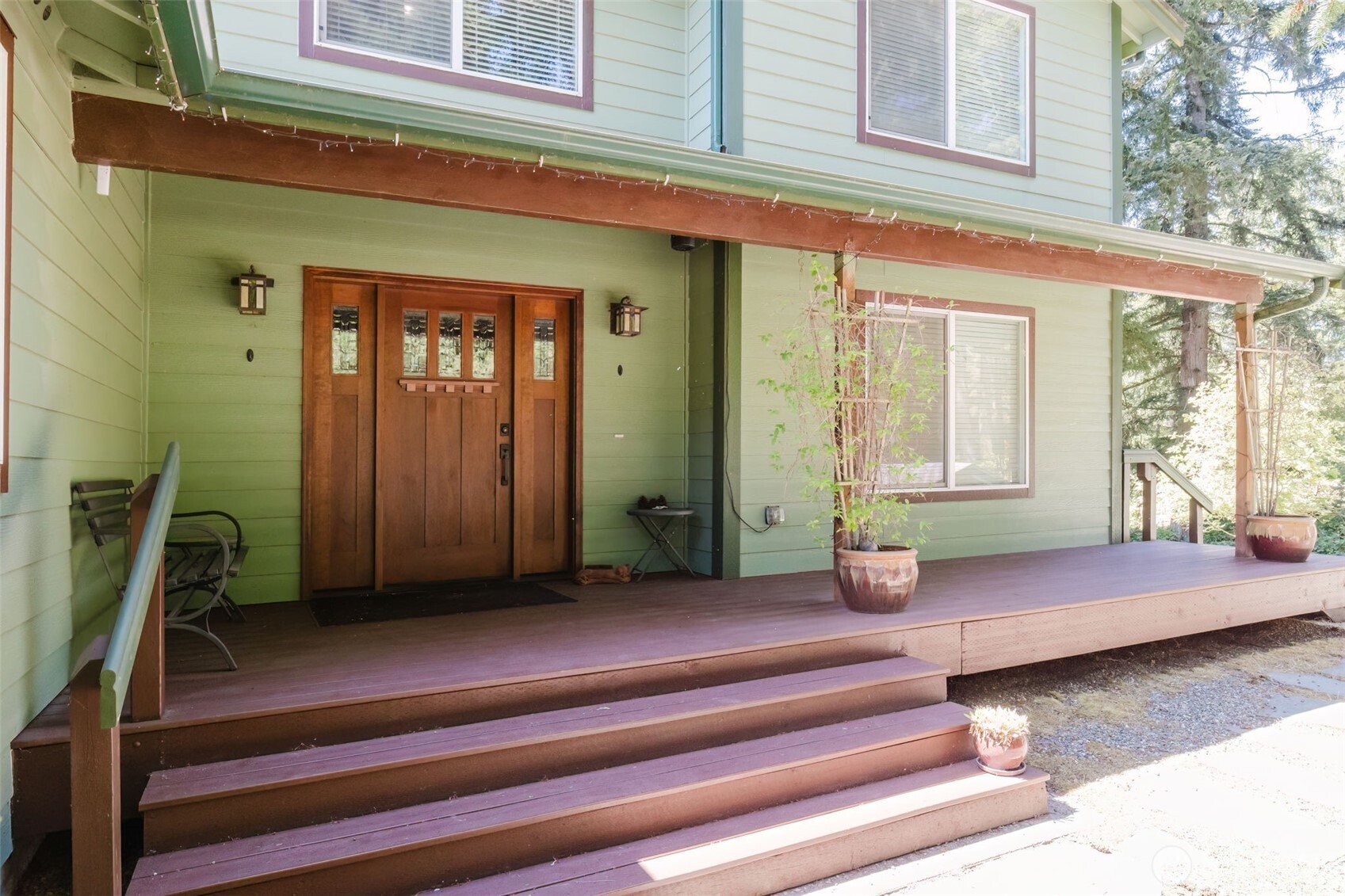 13818 Glenwood Road Southwest Port Orchard, WA 98367 - Photo 2 of 40 a bedroom with a bed and a window