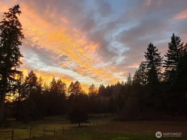 a view of a golf course with a lake