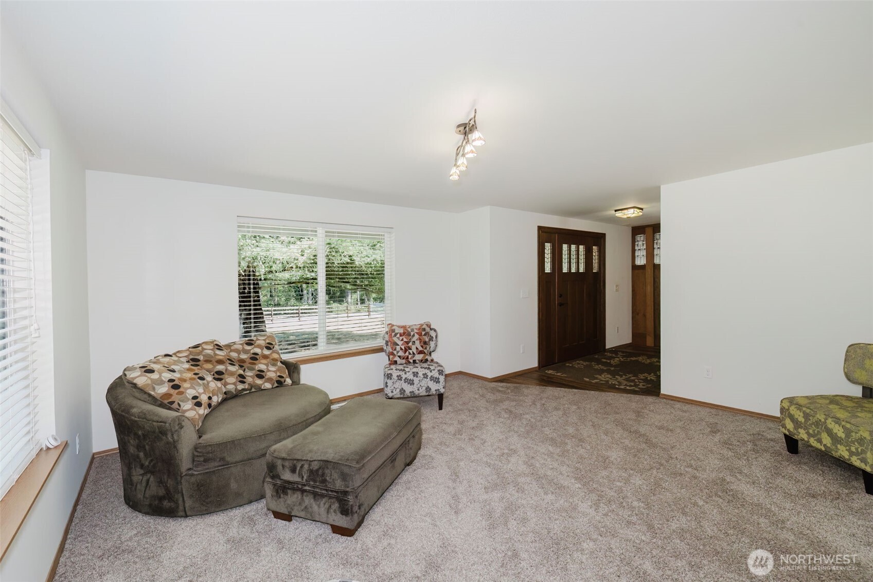 13818 Glenwood Road Southwest Port Orchard, WA 98367 - Photo 7 of 40 a living room with furniture and window