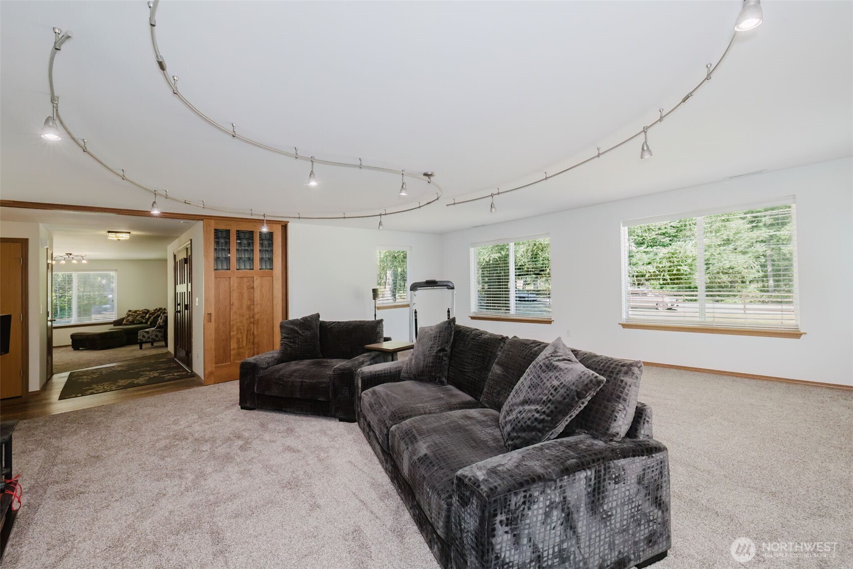 13818 Glenwood Road Southwest Port Orchard, WA 98367 - Photo 8 of 40 a living room with furniture and a large window