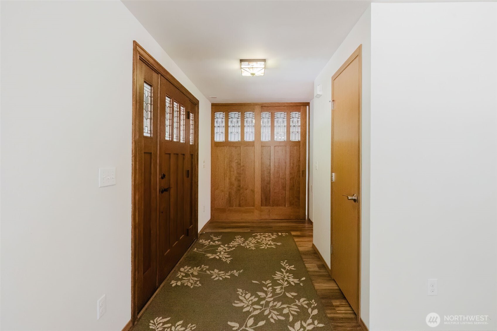 13818 Glenwood Road Southwest Port Orchard, WA 98367 - Photo 10 of 40 a view of hallway with closet