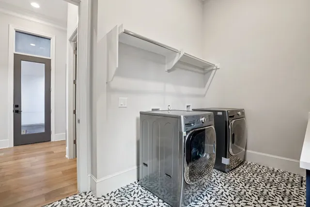 a view of a storage & utility room with a sink