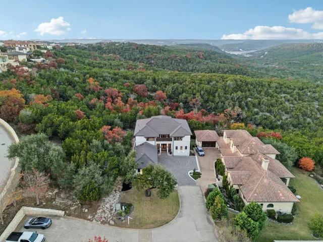 a front view of a house with garage