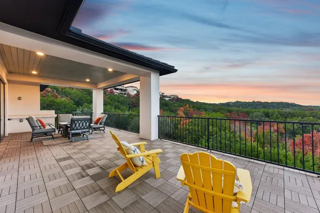 a view of swimming pool with outdoor seating