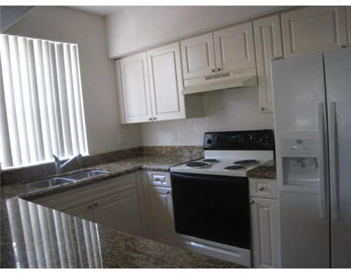 6724 West Sample Road, Unit B24 Coral Springs, FL 33067 - Photo 6 of 11 Kitchen