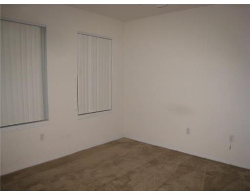 6724 West Sample Road, Unit B24 Coral Springs, FL 33067 - Photo 9 of 11 Master Bedroom