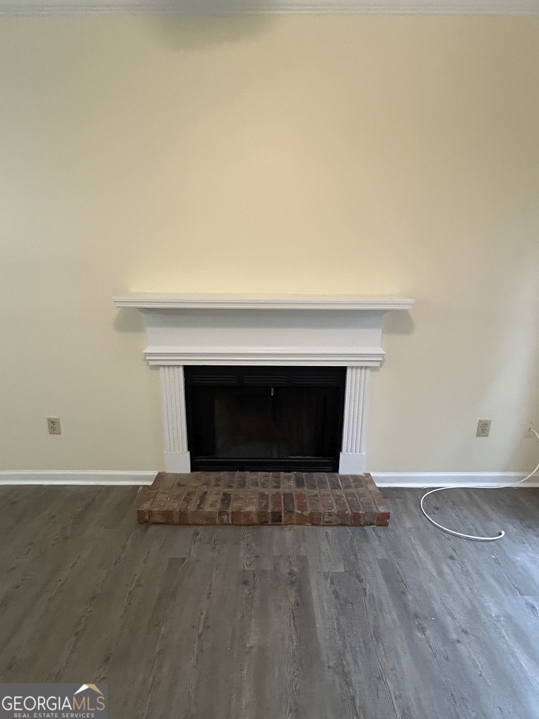 250 Cleveland Road, Unit 219 Bogart, GA 30622 - Photo 8 of 20 a view of empty room with wooden floor