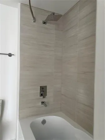 a bathroom with a sink and a shower