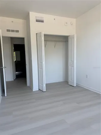 a view of a livingroom with wooden floor