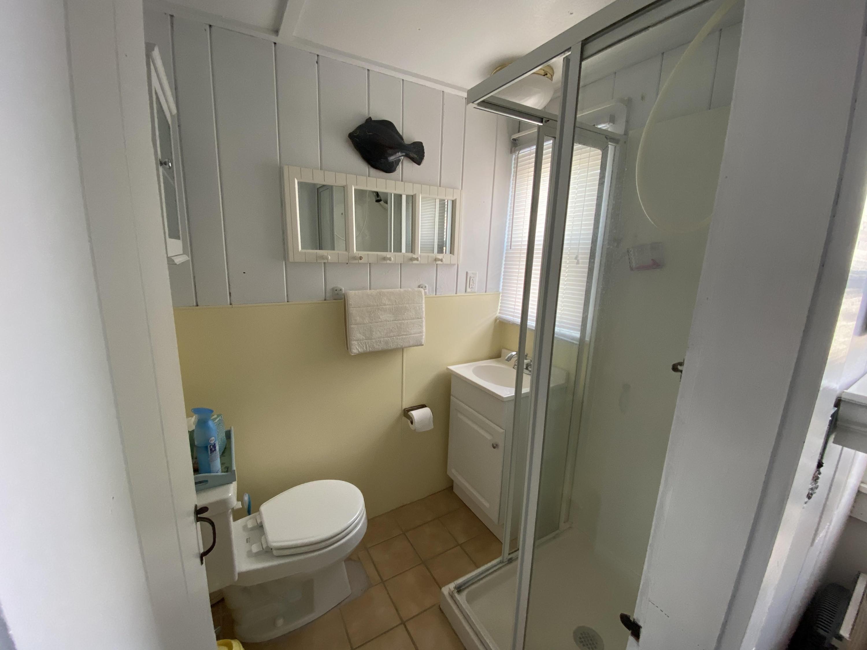 110 Glendon Road, Unit 8 Dennis Port, MA 02639 - Photo 19 of 21 a bathroom with a toilet and a shower