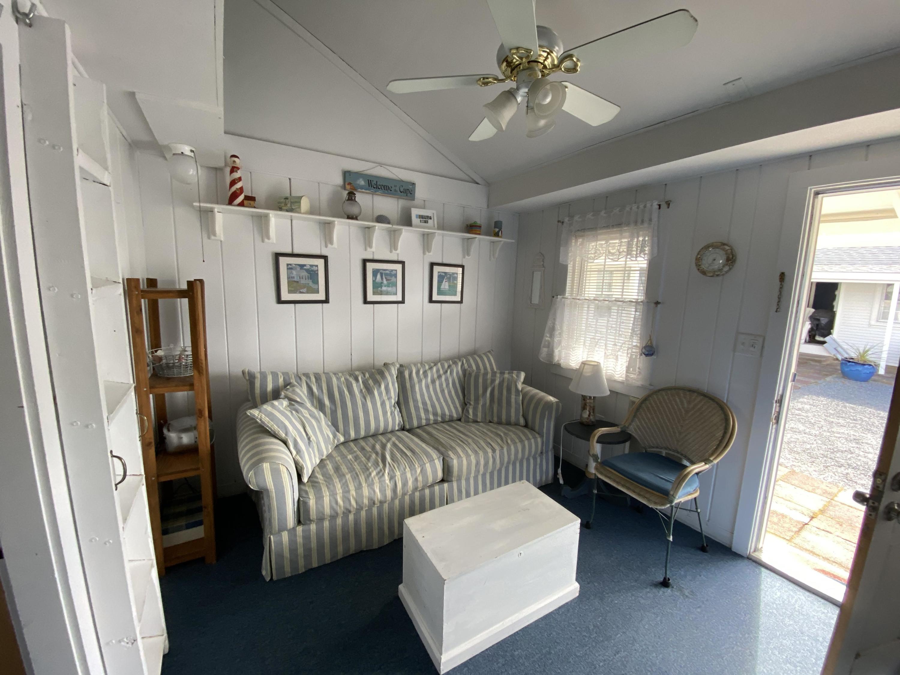 110 Glendon Road, Unit 8 Dennis Port, MA 02639 - Photo 5 of 21 a living room with furniture and a window