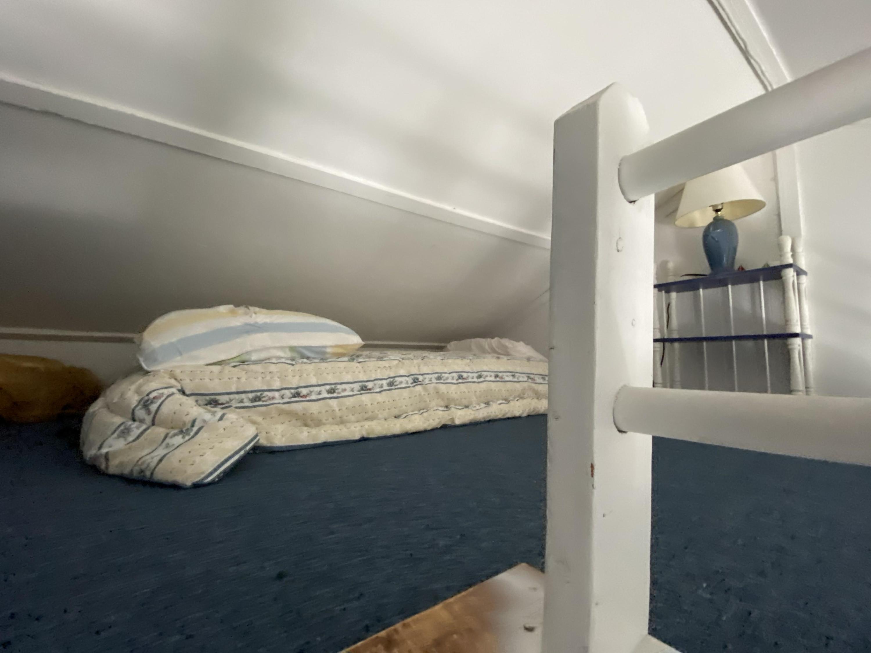 110 Glendon Road, Unit 8 Dennis Port, MA 02639 - Photo 9 of 21 a bedroom with a bed and a window