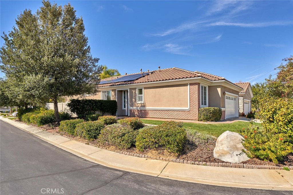 1143 Saguara Road Beaumont, CA 92223 - Photo 13 of 66 a front view of a house with a yard