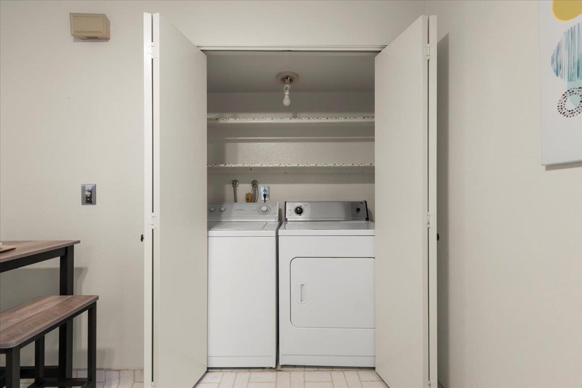 100 Strathmore Place Los Gatos, CA 95032 - Photo 12 of 39 a view of storage and utility room with washer and dryer