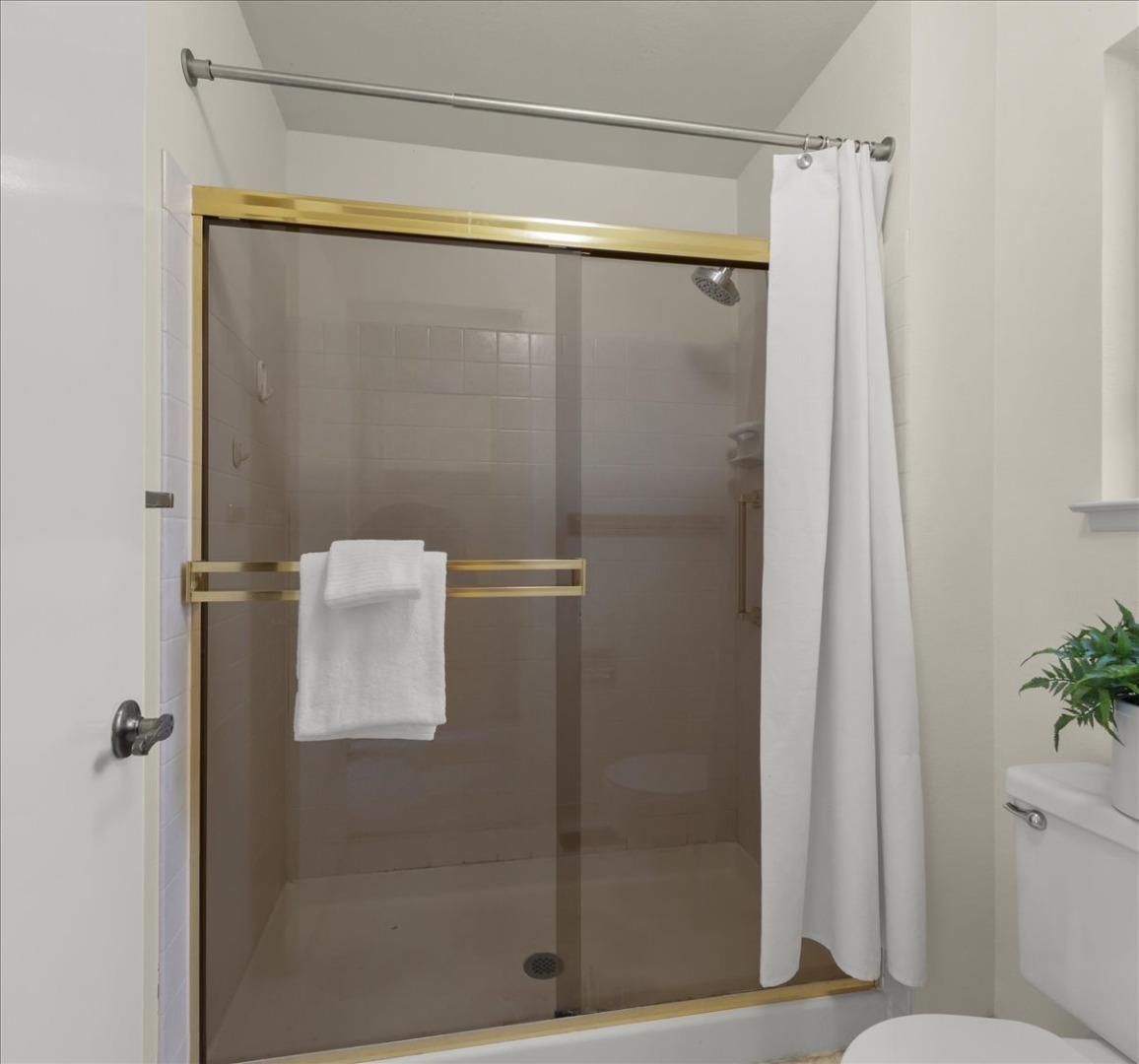 100 Strathmore Place Los Gatos, CA 95032 - Photo 24 of 39 a bathroom with a shower and a sink