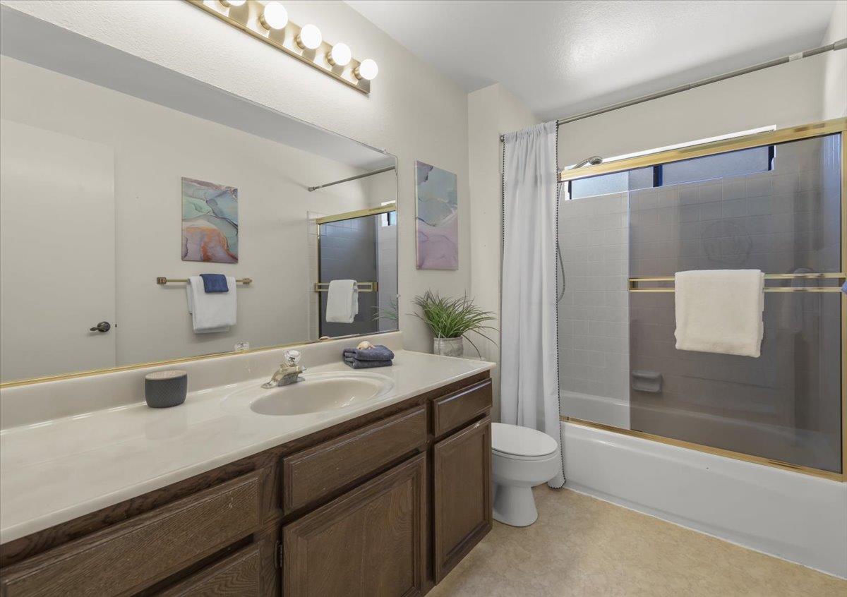 100 Strathmore Place Los Gatos, CA 95032 - Photo 27 of 39 a bathroom with a sink a toilet and shower