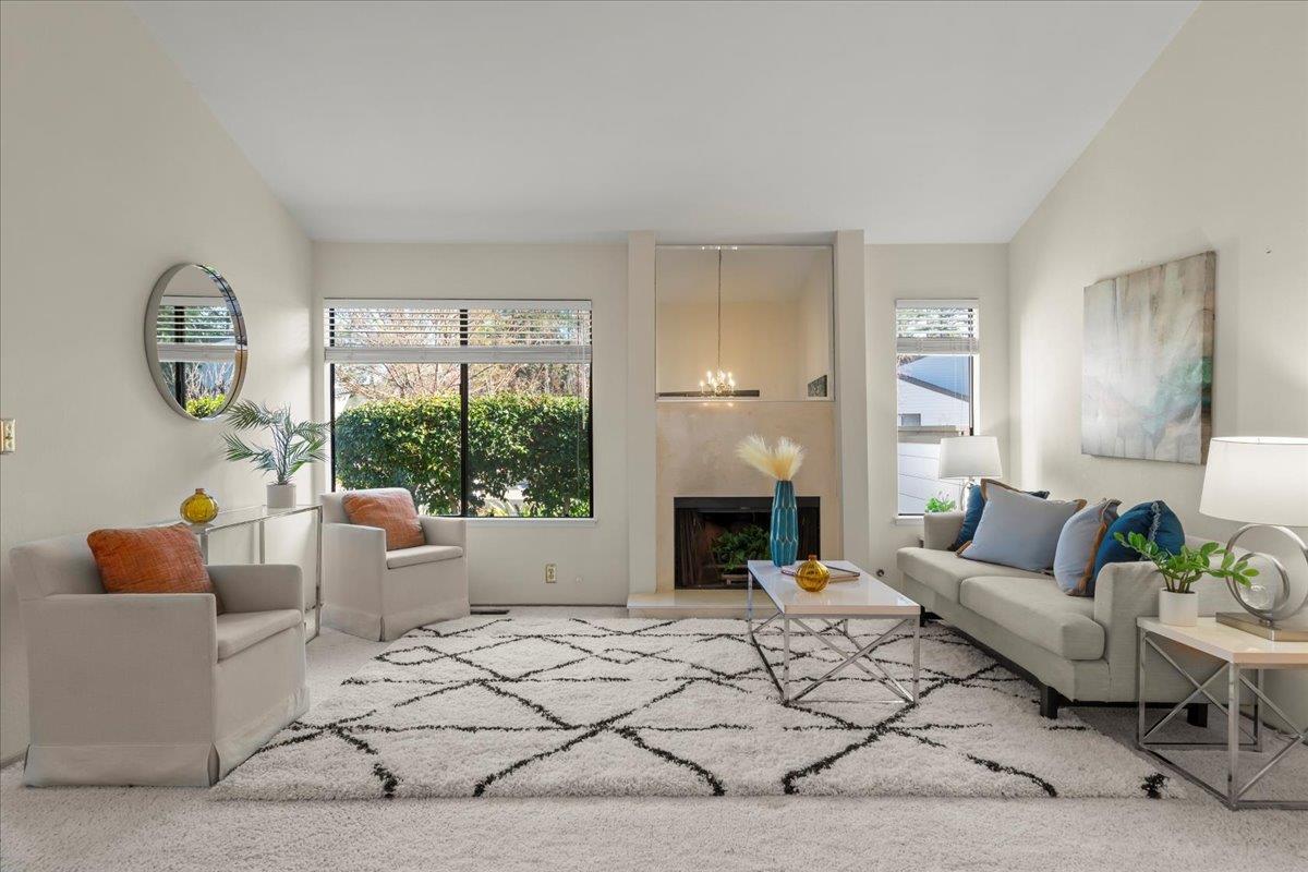 100 Strathmore Place Los Gatos, CA 95032 - Photo 3 of 39 a living room with furniture and a large window