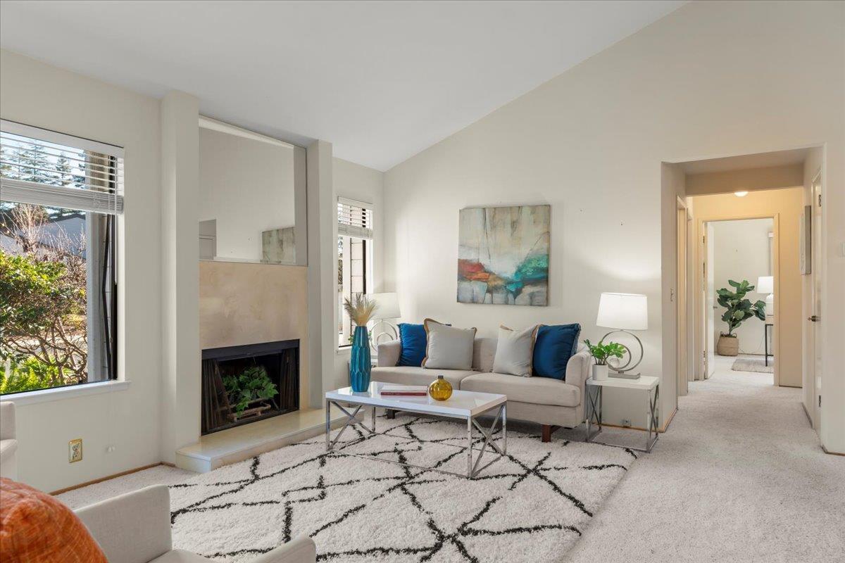 100 Strathmore Place Los Gatos, CA 95032 - Photo 4 of 39 a living room with furniture and a fireplace
