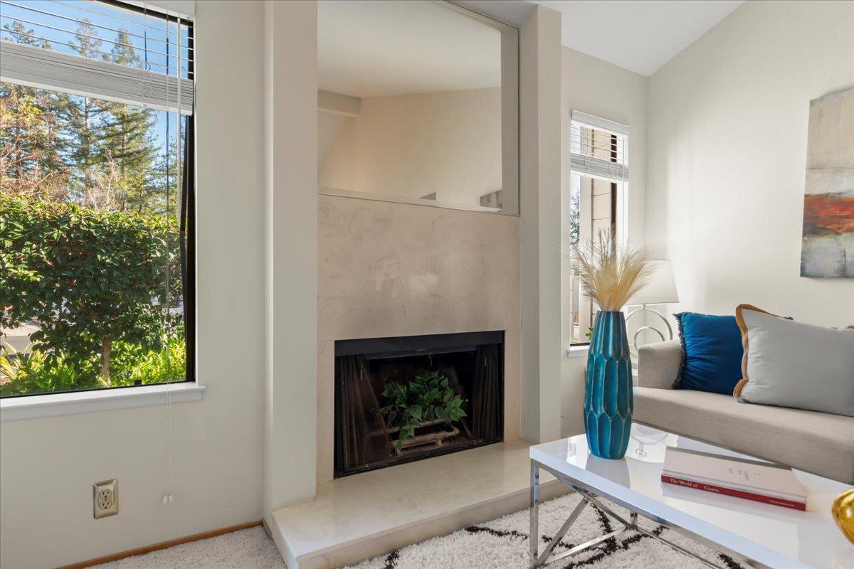 100 Strathmore Place Los Gatos, CA 95032 - Photo 5 of 39 a living room with furniture a window and a fireplace
