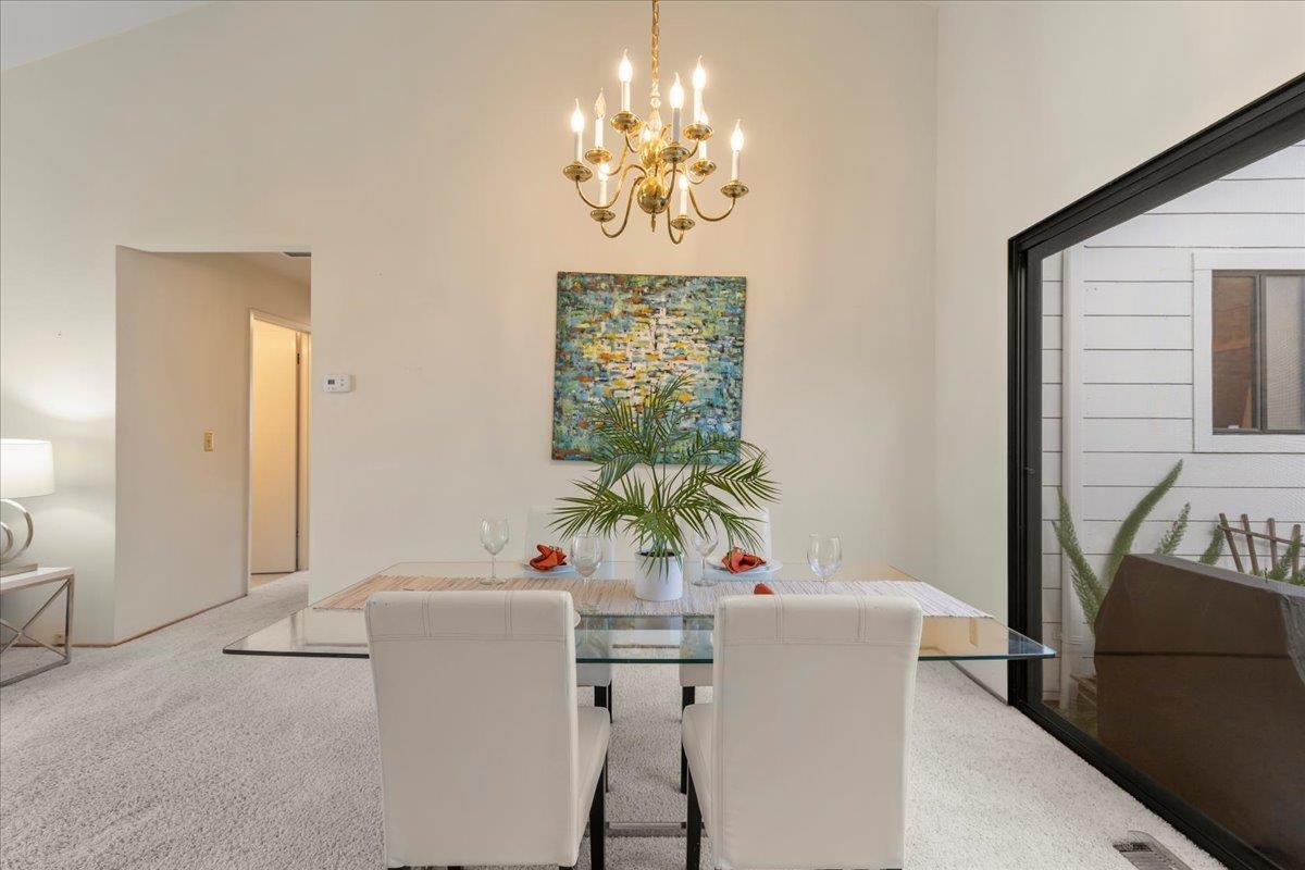 100 Strathmore Place Los Gatos, CA 95032 - Photo 8 of 39 a view of dining room with furniture and chandelier