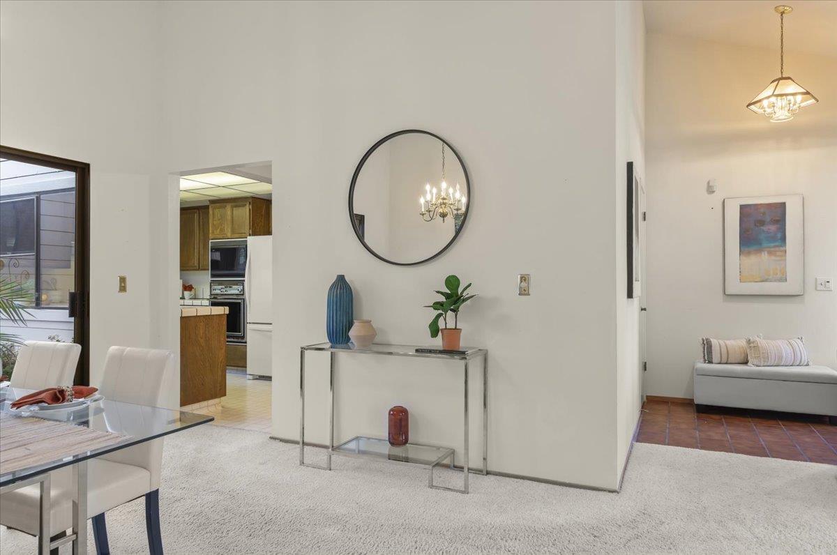 100 Strathmore Place Los Gatos, CA 95032 - Photo 9 of 39 a view of a livingroom with furniture and a mirror