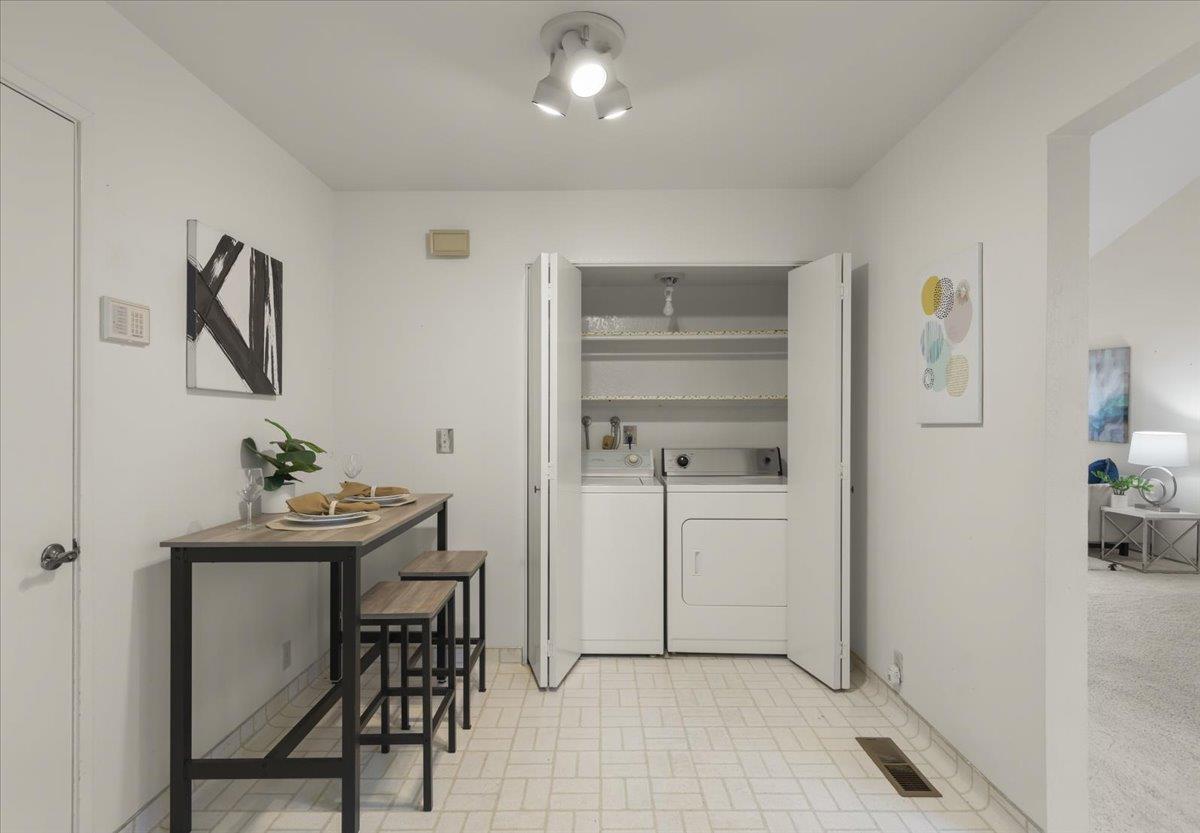 100 Strathmore Place Los Gatos, CA 95032 - Photo 10 of 39 a room with a table and chairs