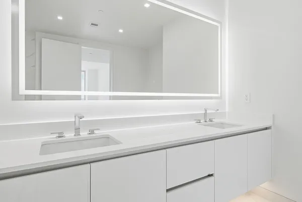 a living room with furniture a dining table and a fireplace