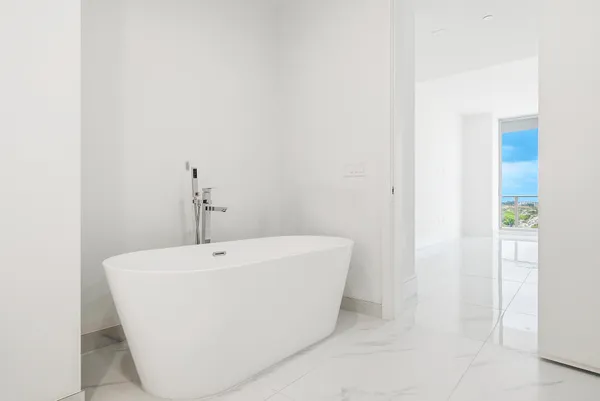 a view of a swimming pool with a lounge chairs