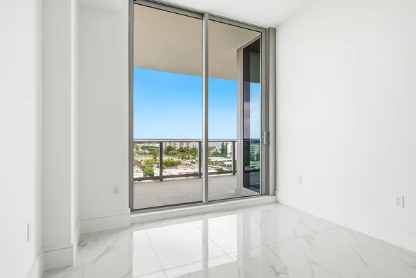 a view of a building with a yard