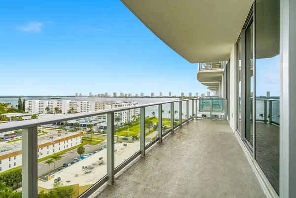 a view of a living room and kitchen