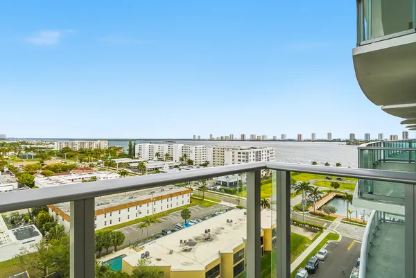 a view of a livingroom with workspace and a couch