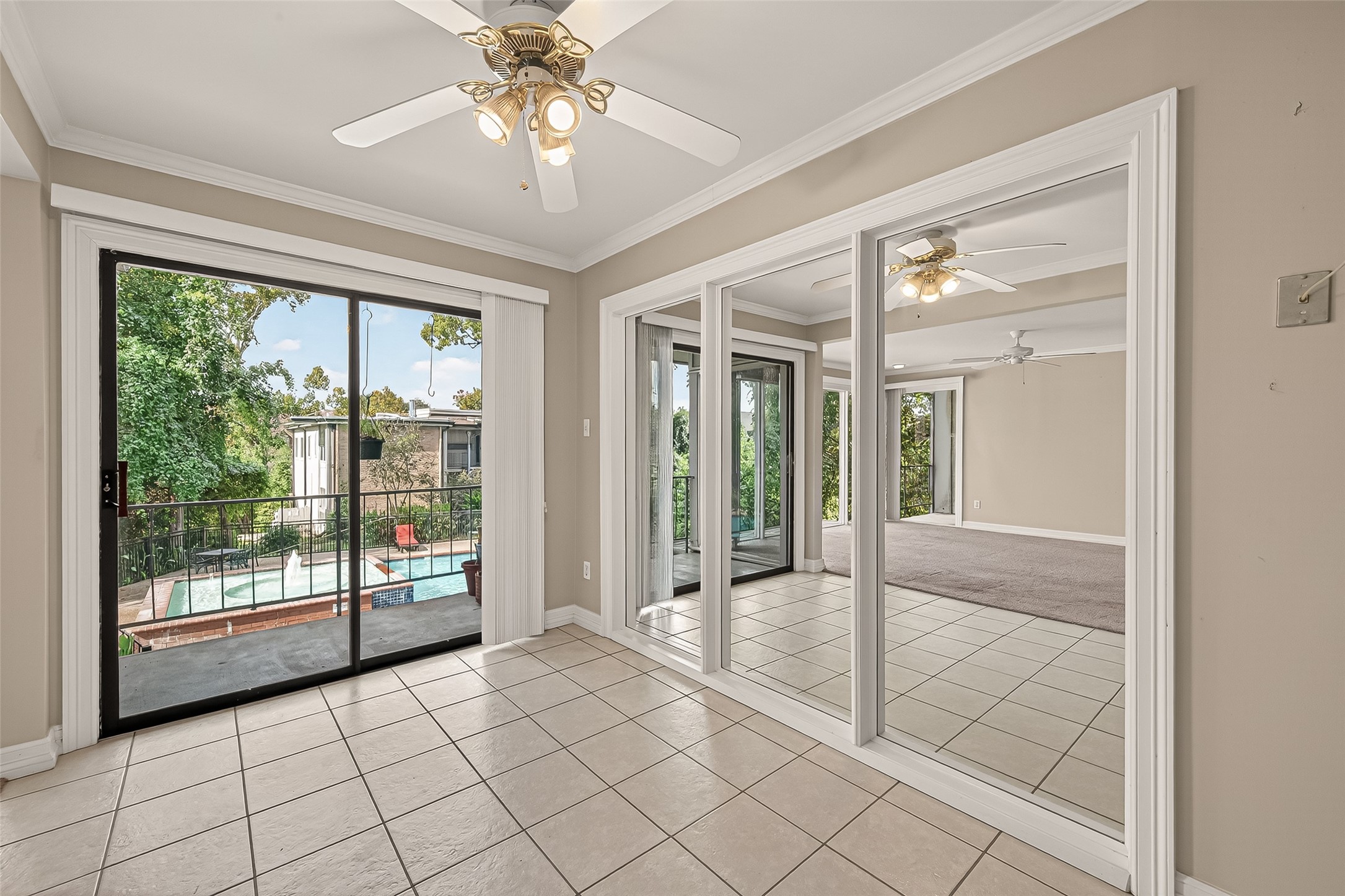 8211 Katy Freeway, Unit 19 Houston, TX 77024 - Photo 13 of 39 a view of an entryway with a chandelier fan