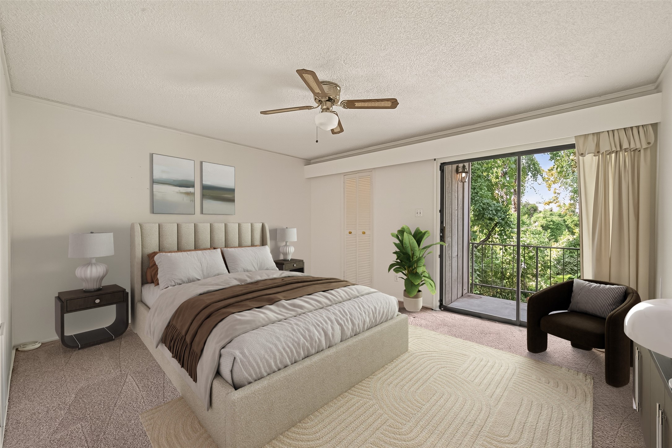 8211 Katy Freeway, Unit 19 Houston, TX 77024 - Photo 20 of 39 a spacious bedroom with a bed and a couch