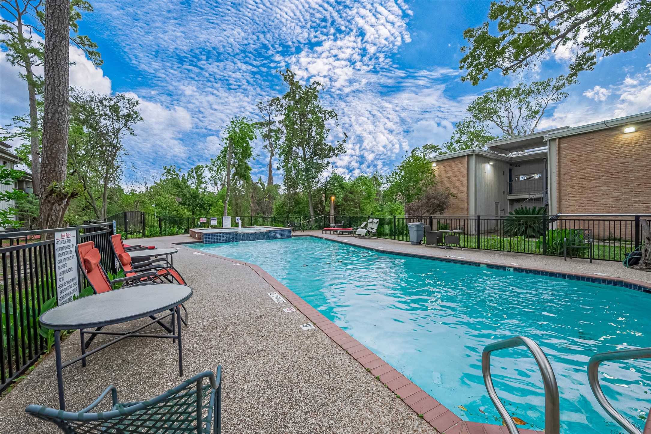 8211 Katy Freeway, Unit 19 Houston, TX 77024 - Photo 29 of 39 a view of deck with patio