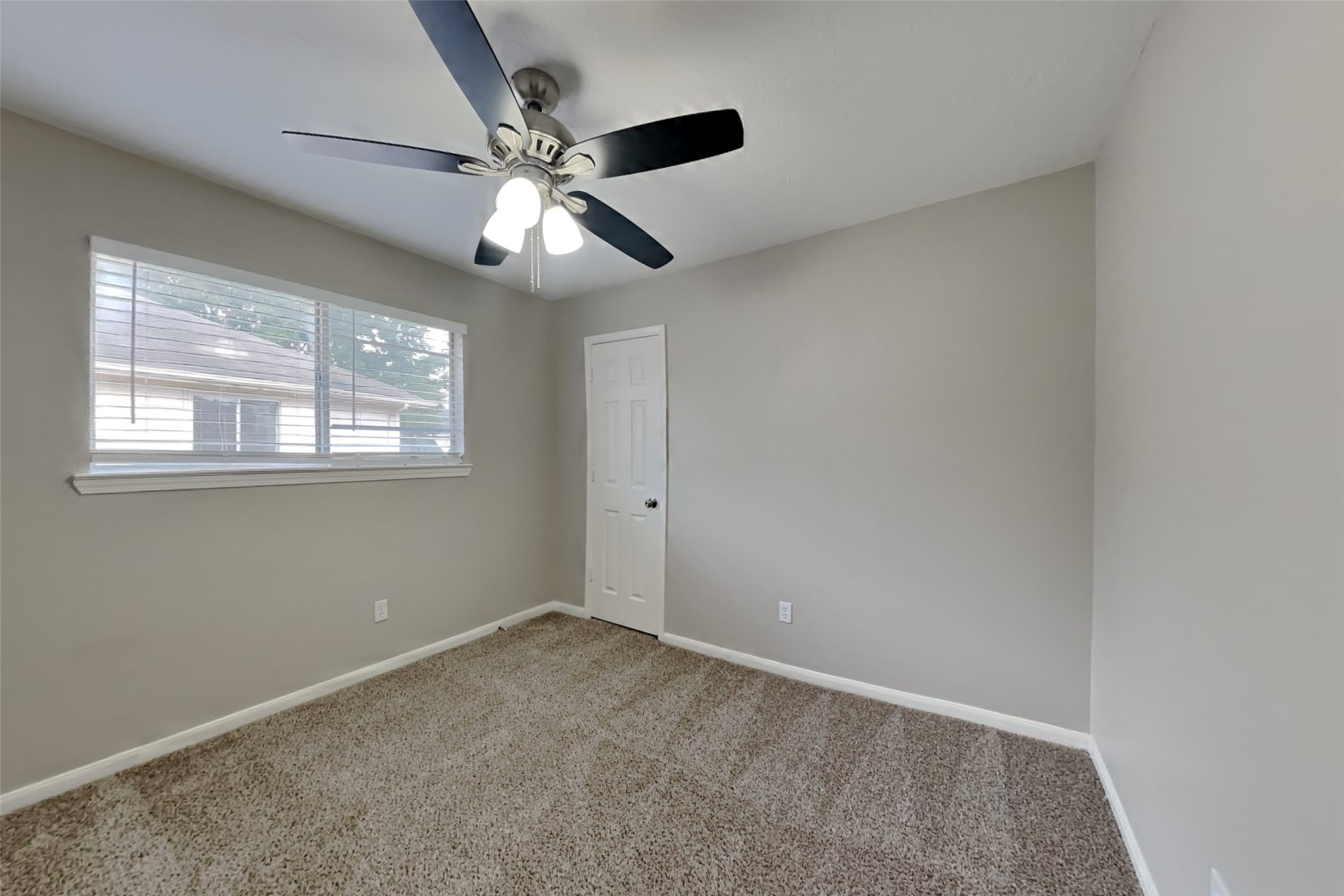 14706 Trailbrook Drive Houston, TX 77095 - Photo 12 of 23 a view of an empty room with a window