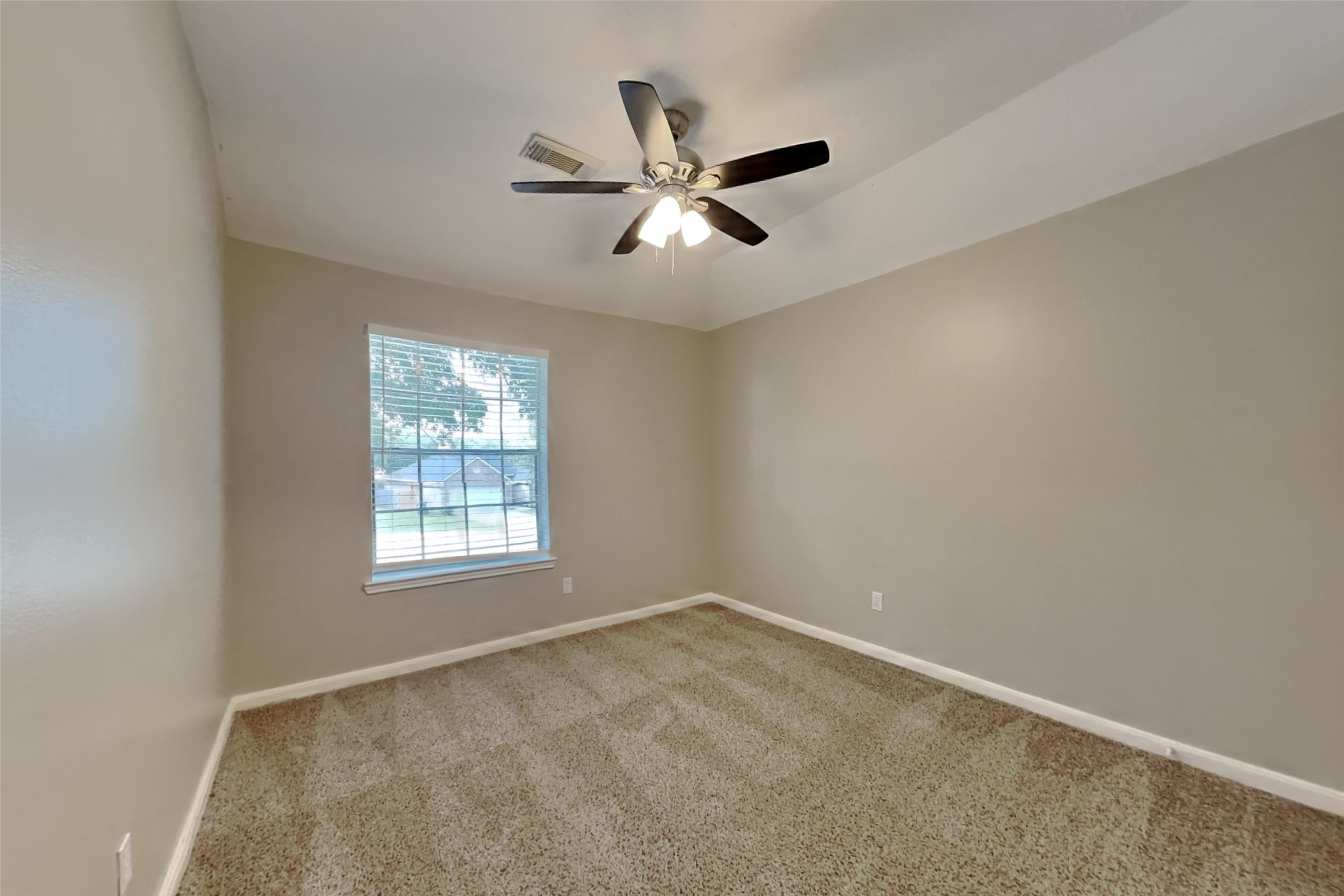 14706 Trailbrook Drive Houston, TX 77095 - Photo 13 of 23 a view of empty room with window