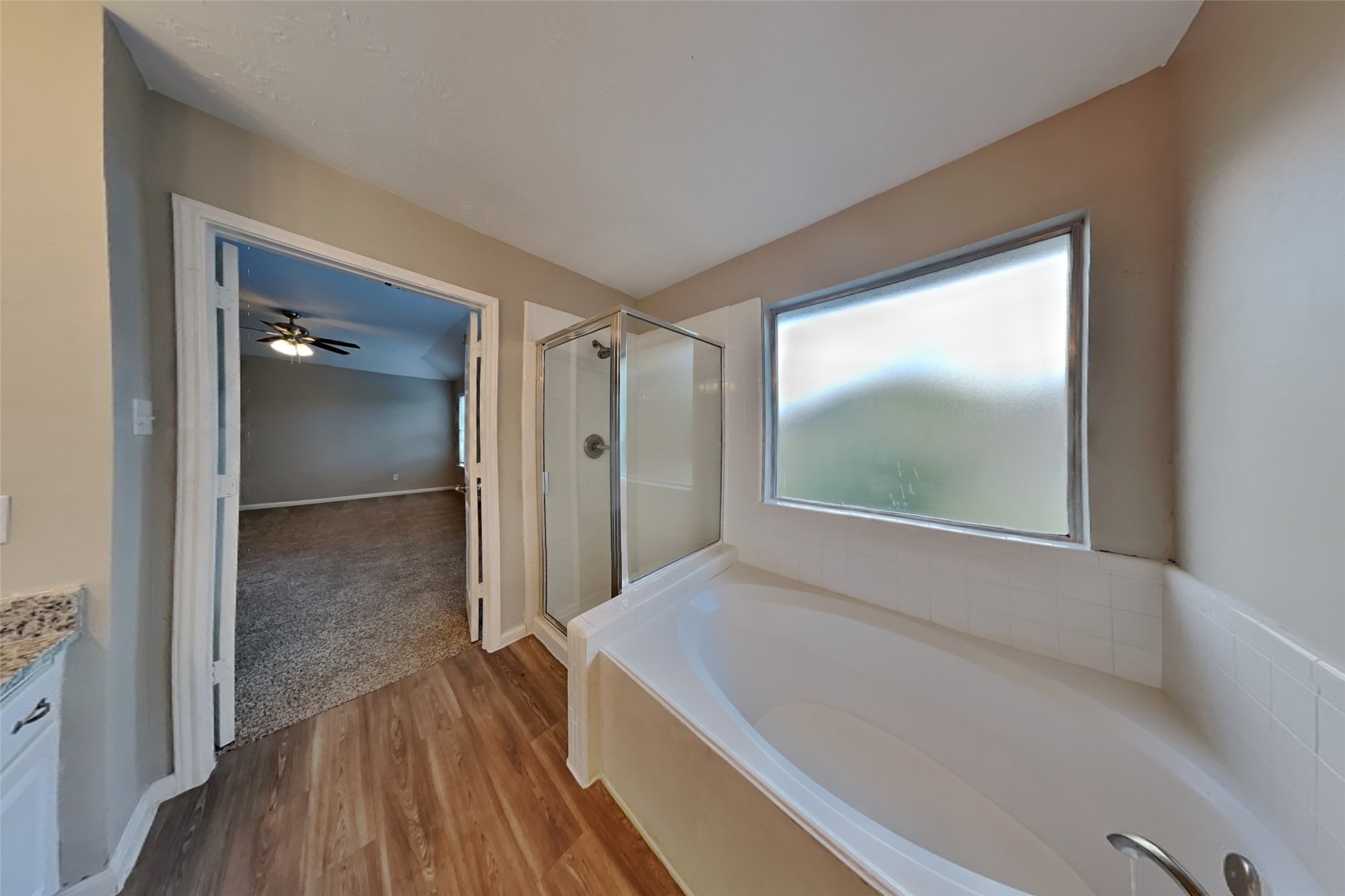 14706 Trailbrook Drive Houston, TX 77095 - Photo 18 of 23 a view of bathroom with a bathtub and shower