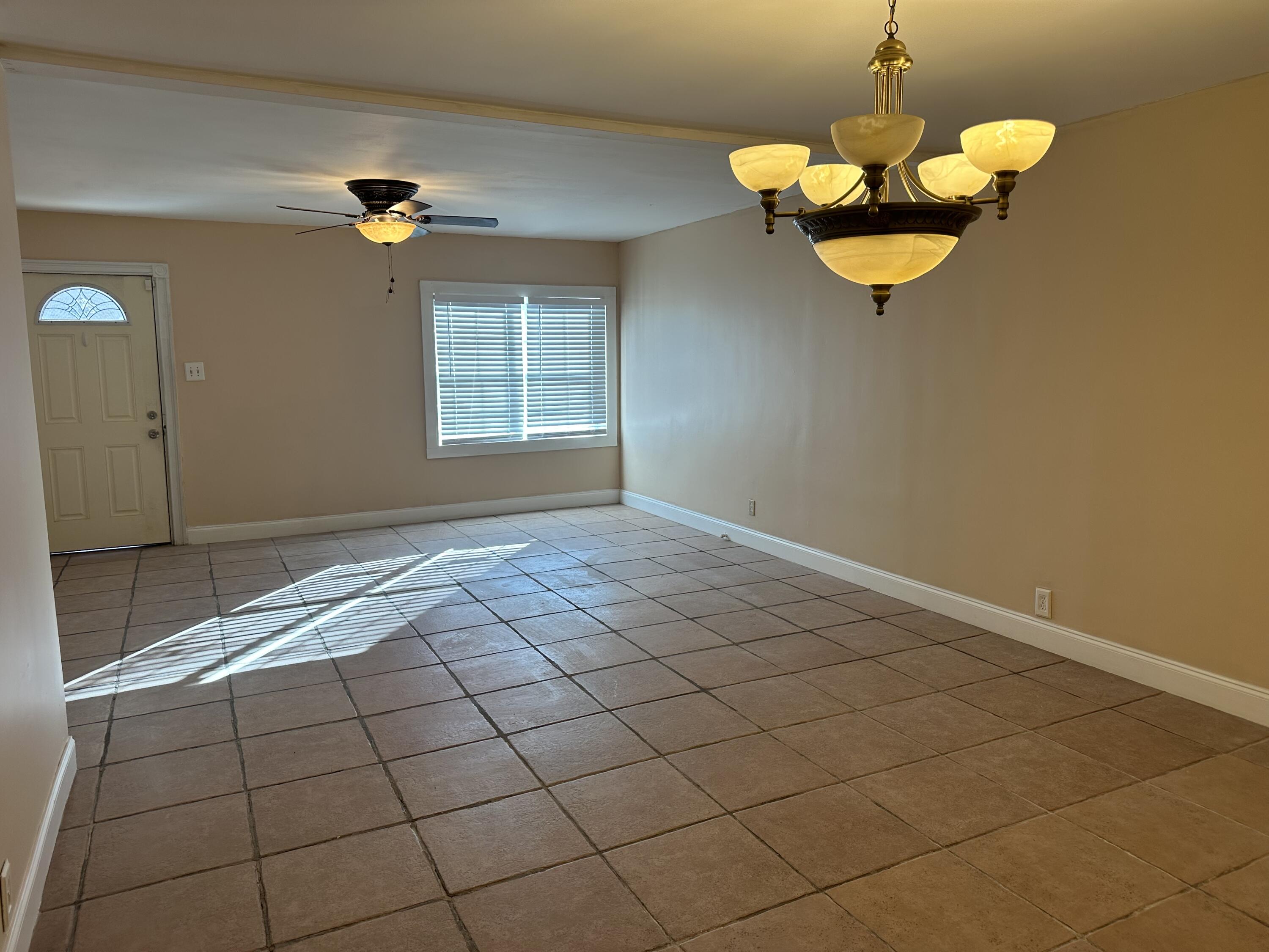 1510 28th Street Lubbock, TX 79411 - Photo 21 of 46 a view of a chandelier fan and a chandelier fan